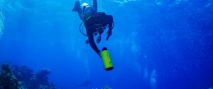 Certified commercial diver conducting underwater inspection